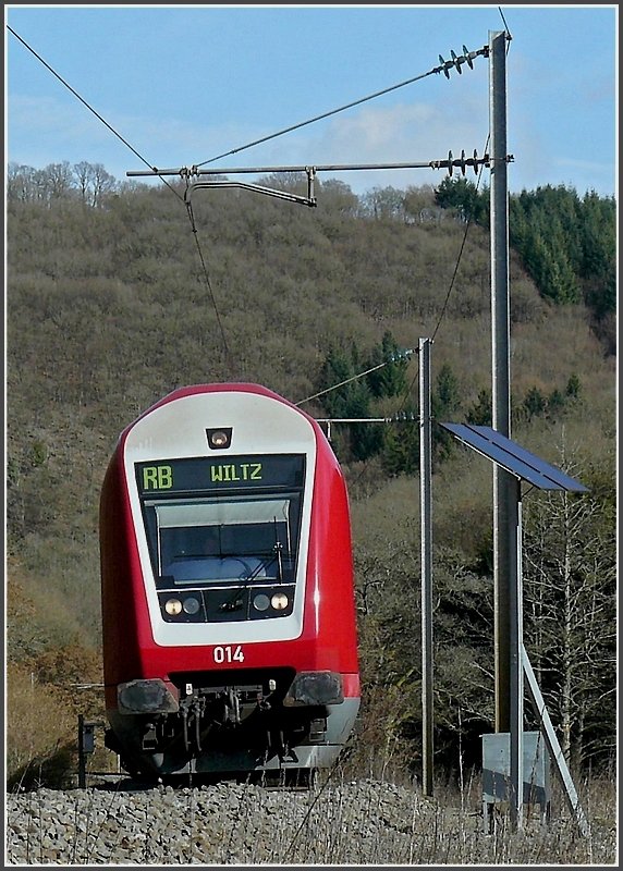 The control car 014 heading a local train to Wiltz pictured near Merkholtz on February 27th, 2010.