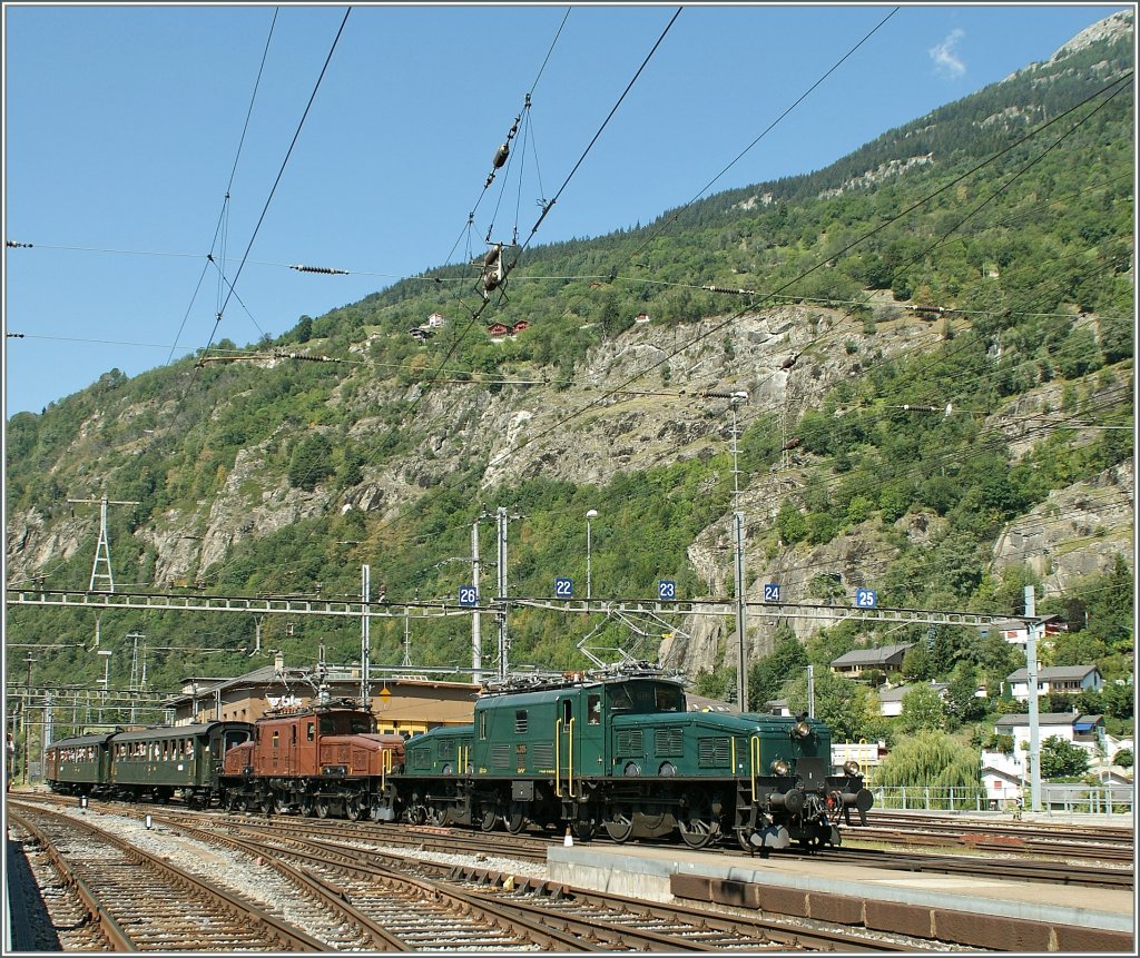 The  Crocodiles Ce 6/8 III 14305 and Ce 6/8 II 14253 arriving with the  SBB Historic  Jubilee train at  Brig. 
20.08.2011