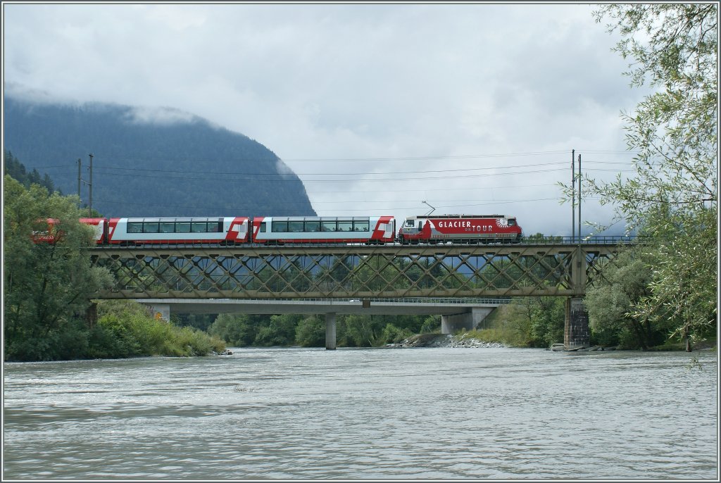 The  Glacier Express  coming from St Moritz on the way to Zermatt by Reichenau.
13.08.2010 