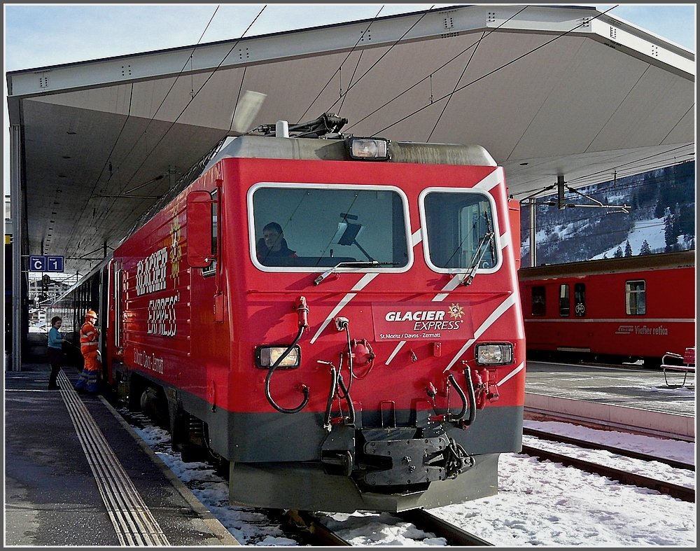 The Glacier Express photographed at Disentis/Mustr on December 26th, 2009.