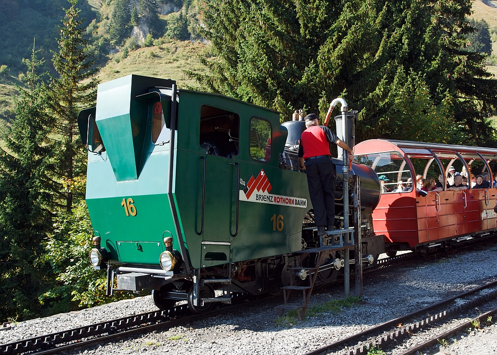 The heating oil-fired BRB 16 (Brienz Rothornbahn) at fill water, on 01.10.2011 Planalp at the station (1346 m above sea level).