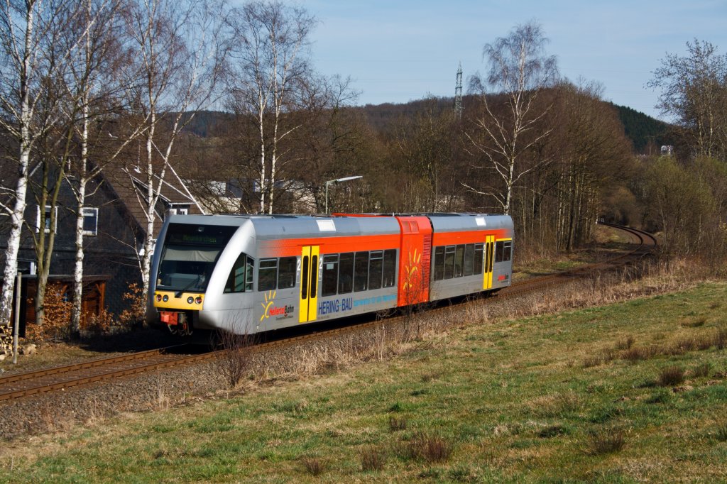 The Hellertalbahn (with Stadler GTW 2 / 6) at 24.03.2011 just after the stopping point Neunkirchen-Struthtten moves the direction Neunkirchen.