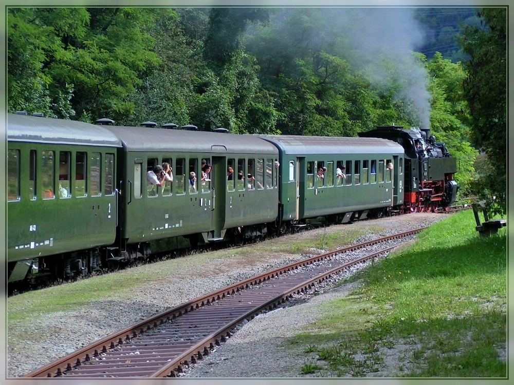 The heritage train is leaving the station of Epfenhofen on August 19th, 2006.