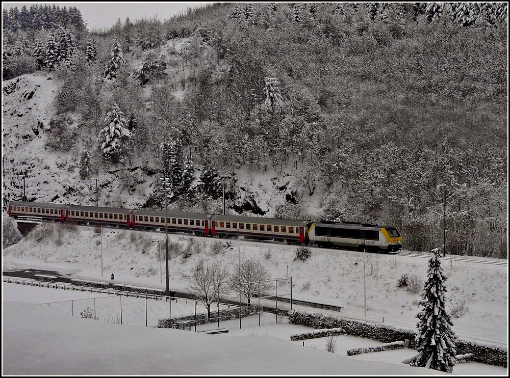 The IR 114 Luxembourg-Liers is running through the snowy landscape near Clervaux on December 18th, 2010.
