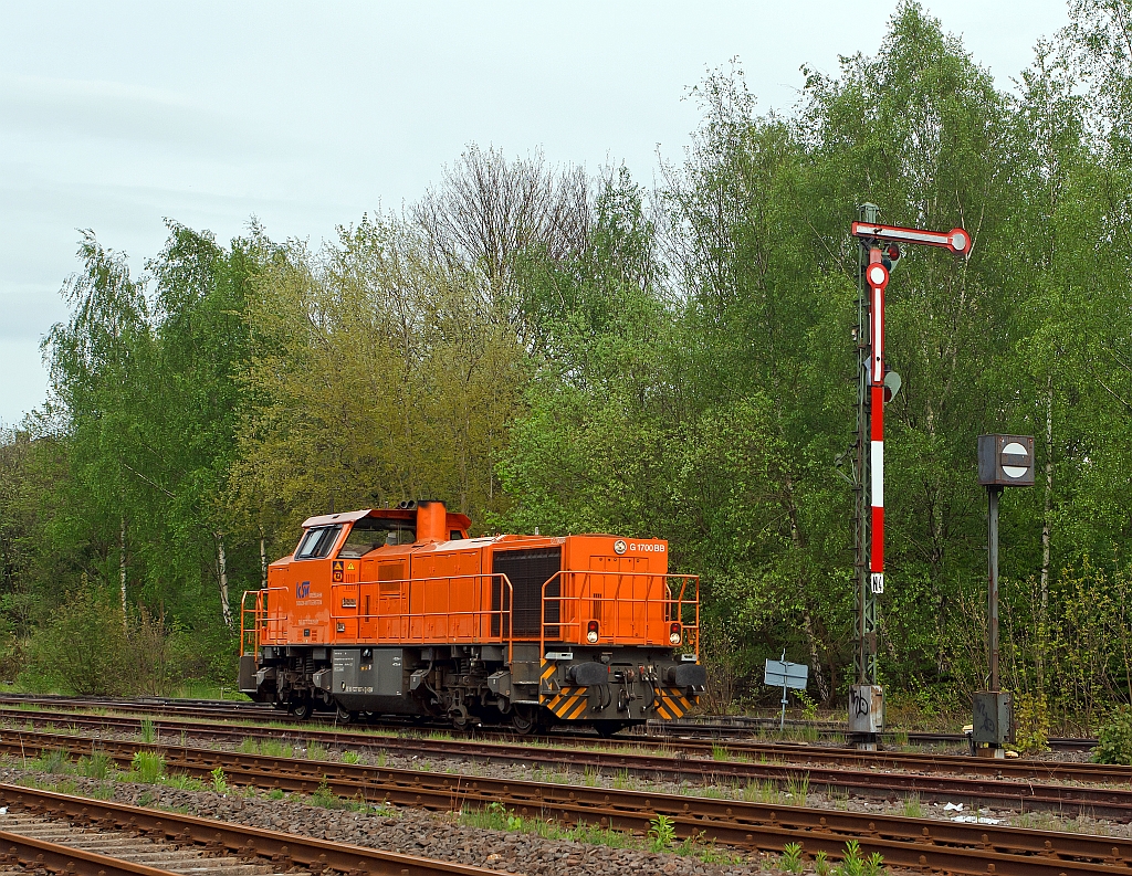 The locomotive No. 46 (a Vossloh G 1700-2 BB) of the Kreisbahn Siegen-Wittgenstein (KSW) on 08.05.2012 alone runs in the direction of Betzdorf, here in the station area of Herdorf.