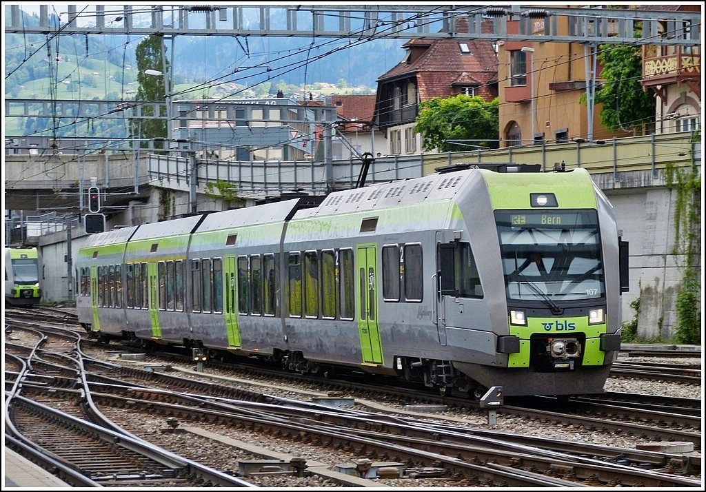 The  Ltschberger  N 107 is running through the station of Spiez on May 22nd, 2012.