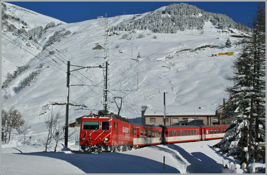 The MGB HGe 4/4 102 is arriving with his train from Disentis in Andermatt. 
12.12.12.