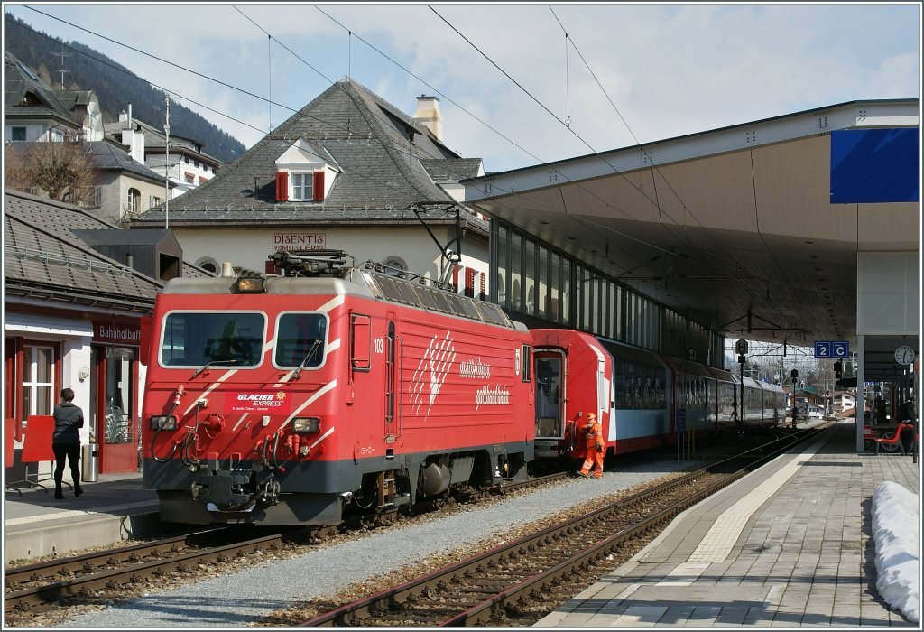 The MGB HGe 4/4 103 takes the Glacier Express in Disentis. 
15.03.2013