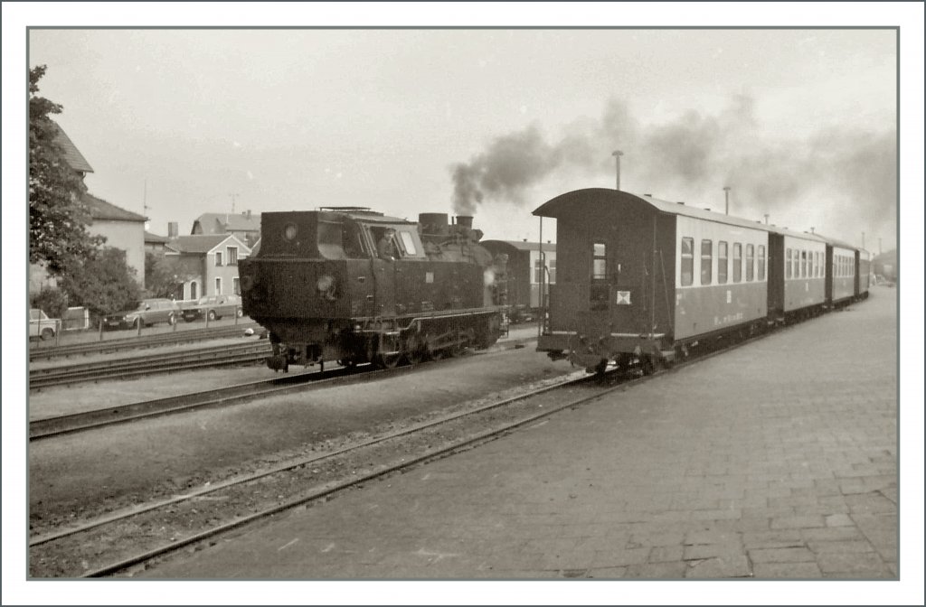 The  Molli  steam engine and coaches in Bad Doberan. 
Sept. 1990.