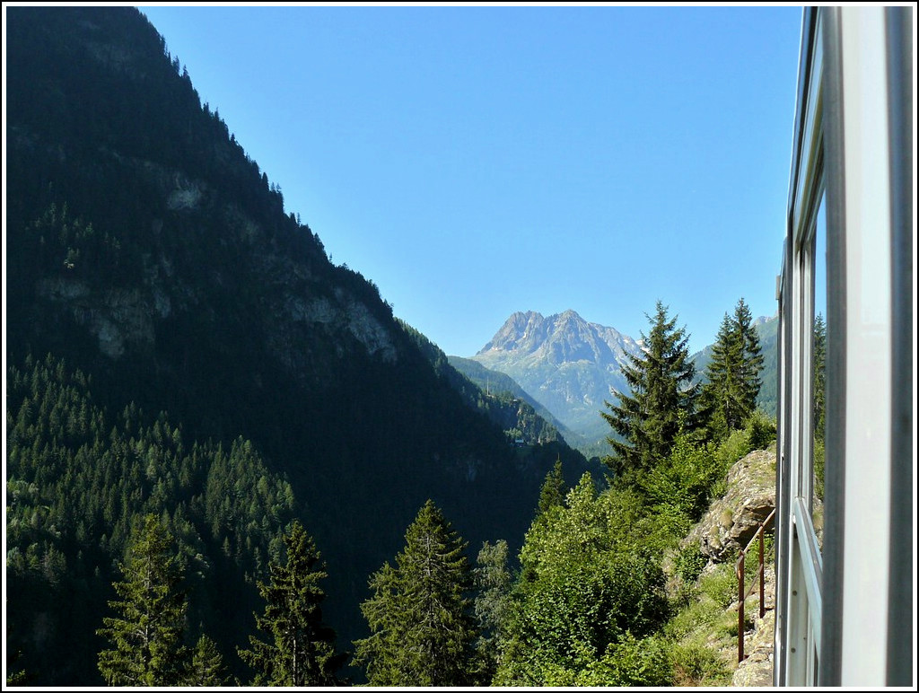 The Mont-Blanc Express is running through the nice landscape between Les Marcottes and Le Trtien on August 3rd, 2008.