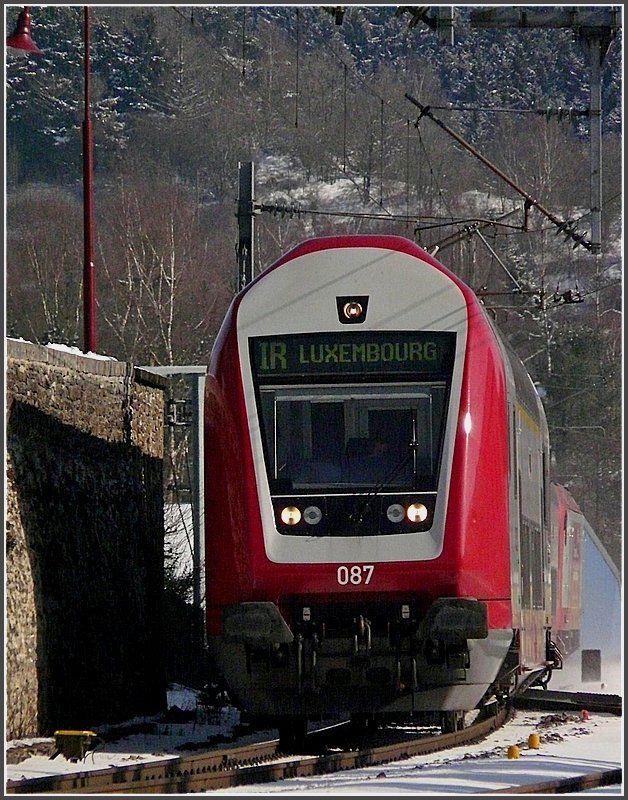 The new control car 087 is heading a local train at Troisvierges on February 16th, 2010.