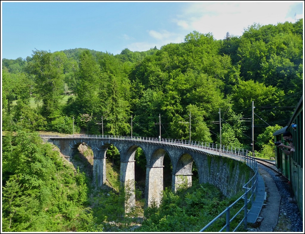 The nice viaduct over the small river Baye de Clarens between the stops Cornaux and Chantemerle on the heritage railway Blonay - Chamby taken out of the train on May 27th, 2012.