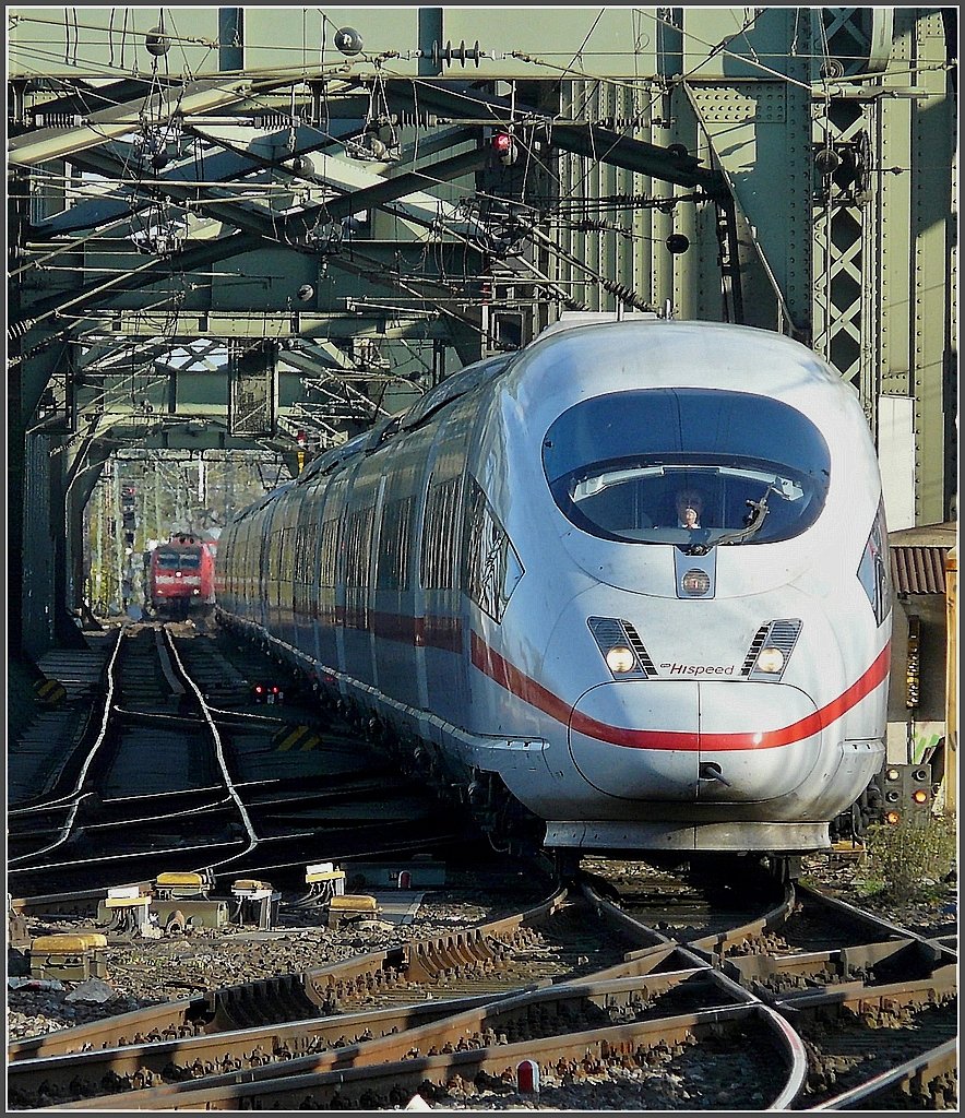 The NS Hispeed ICE 3 is crossing the  Hohenzollern  bridge just before arriving to the main station of Cologne on November 8th, 2008.