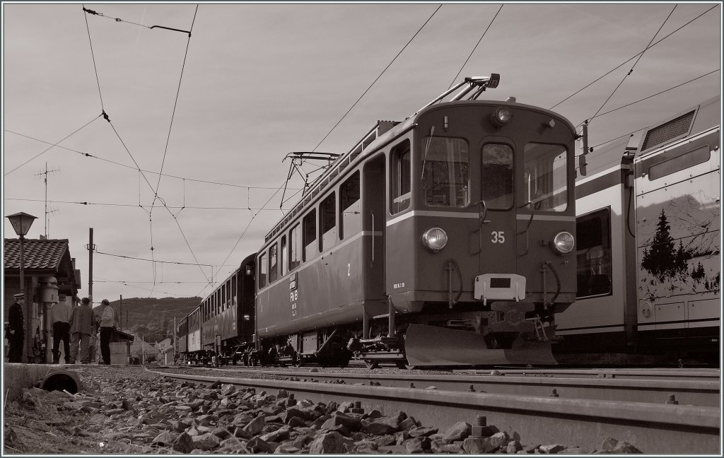 The RhB Bernina ABe 4/4 35 by the Blonay Chamby Railways is arrived with the special service from Vevey to Chamby in the Blonay Station. 
12.06.2011

