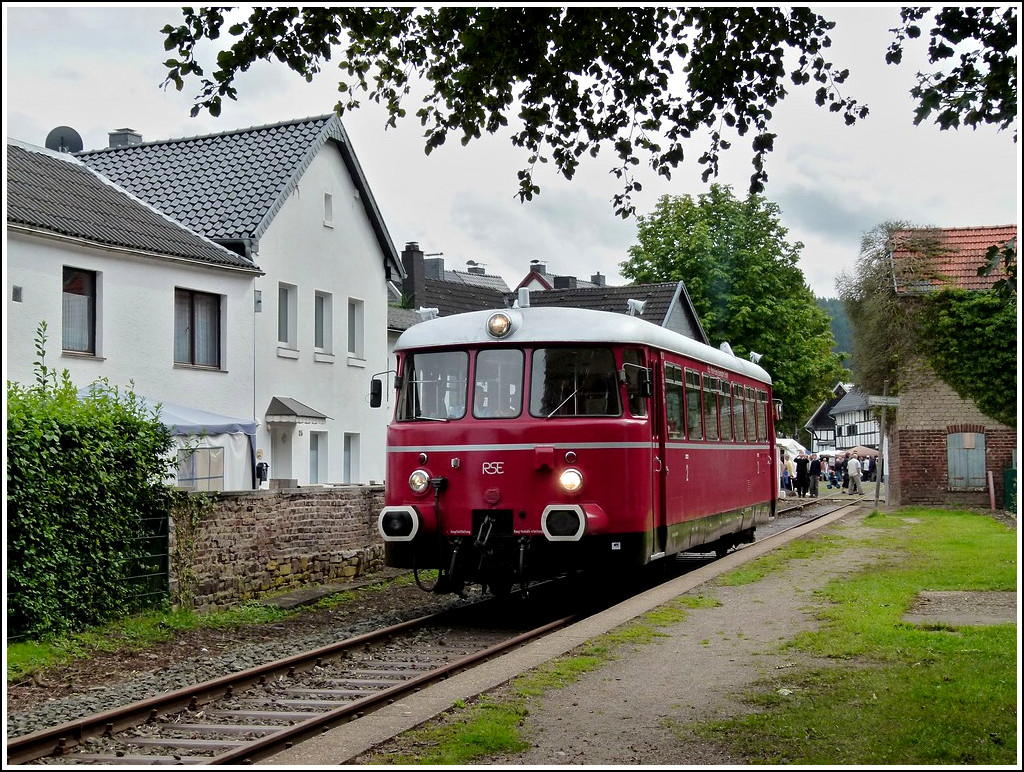 The RSE MAN railcar VT 23 is arriving at the stop Olef on the Oleftalbahn on August 28th, 2011.