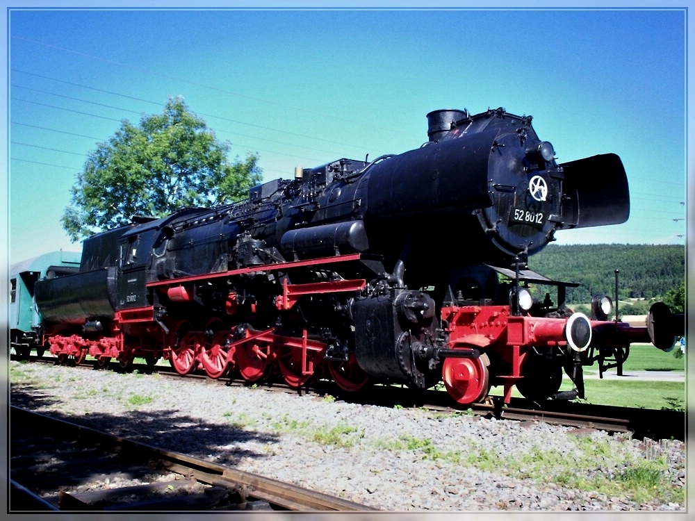 The steam engine 52 8012 of the Wutachtalbahn e.V. taken in Zollhaus-Blumberg on August 8th, 2006. 