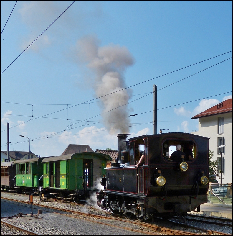 The steam engine BAM N6 is running through the station of Blonay on May 27th, 2012.