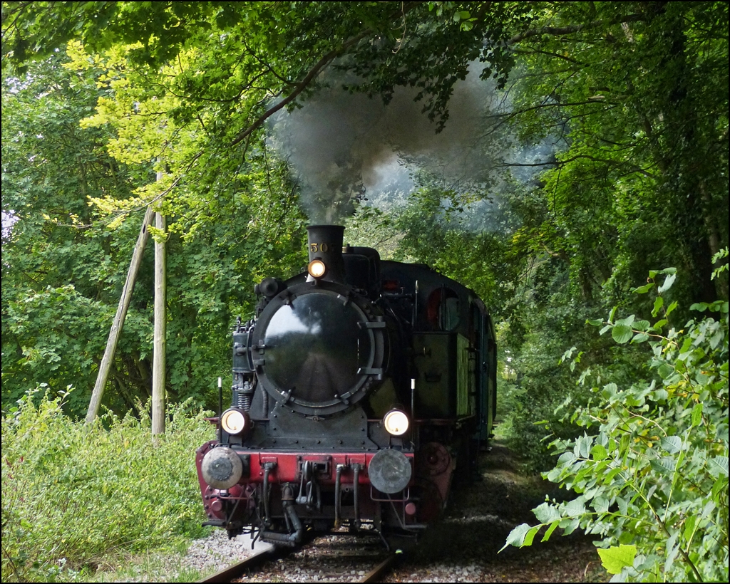 The steam engine KDL 7  Energie 507  is hauling its heritage train from Pétange to Fond de Gras on September 23rd, 2012.