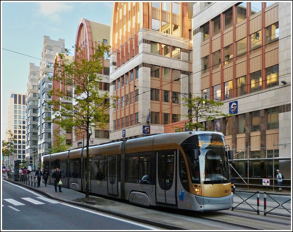 The tram N° 3017 is leaving the stop Suède in Brussels on June 22nd, 2012.