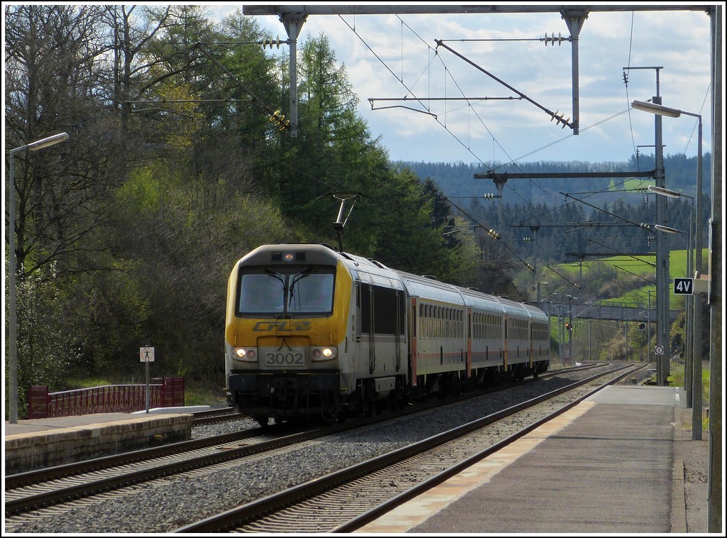 The very dirty 3002 is heading the IR 110 Luxembourg City - Liers in Wilwerwiltz on April 30th, 2012.