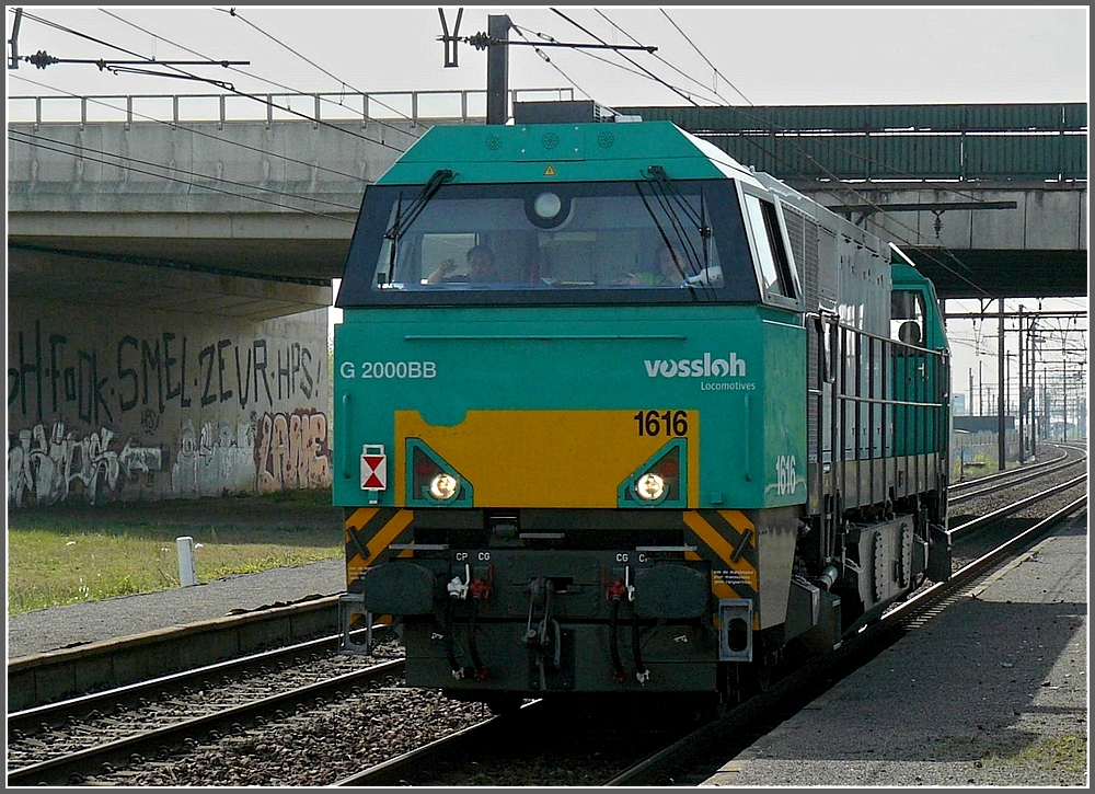 The Vossloh MaK G 2000 1616 is running through the station of Antwerpen Noorderdokken (B) on April 24th, 2010.