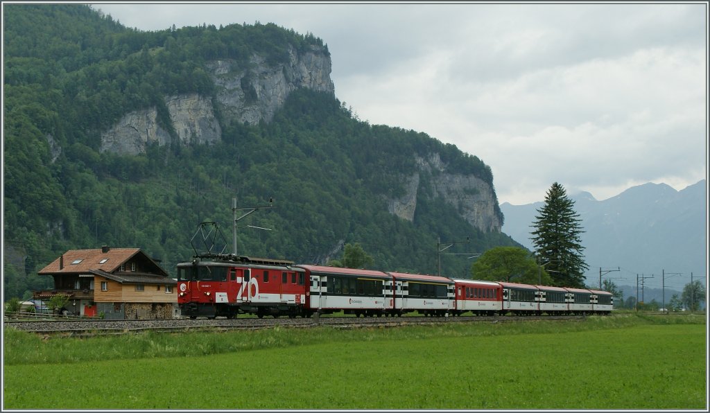 The  Zentralbahn  De 110 022-1 with Brnig IR from Interlaken Ost to Luzern by Meiringen.
01.06.2012