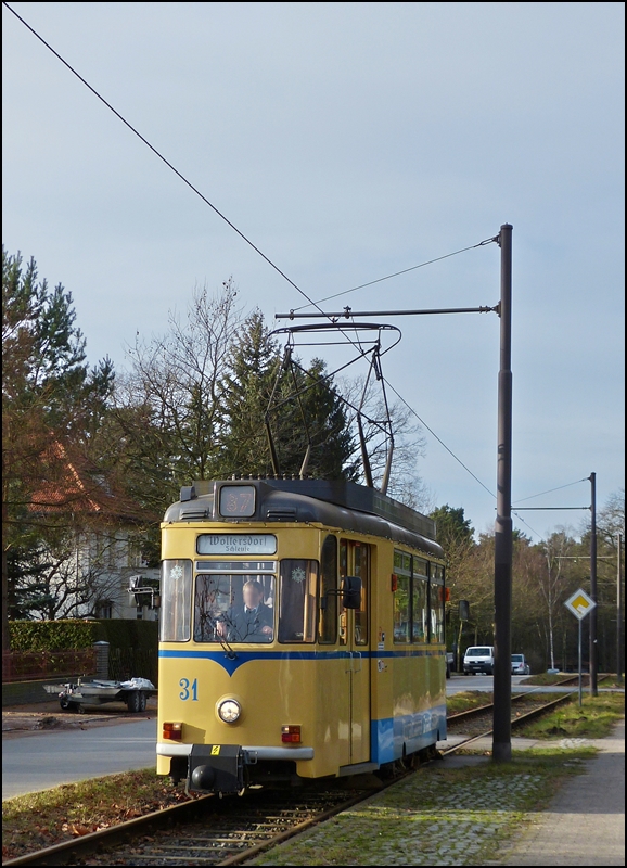 Tram N° 31 to Woltersdorf Schleuse is arriving at the stop Goethestraße in Woltersdorf on December 27th, 2012.