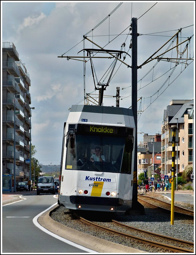 Tram N 6034 is ruuning through Westende-Bad on July 23rd, 2011.