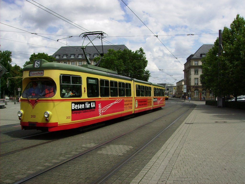 Tramcar 202 at the main-station of Karlsruhe. He is on tour as a driving school, at 25.07.2011
