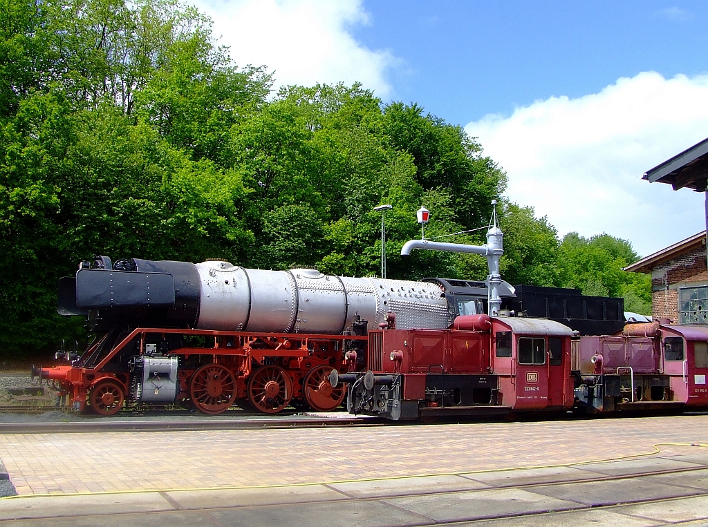Two Köf II (323842-5 and 323864-9) located in front of the workup Steam Locomotive 44 508 , on the 30/05/2010 before the historic Lokstation Westerburg (Westerwald), Germany.