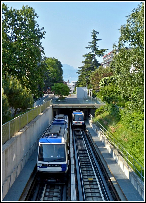 Two metro trains are meeting in Lausanne on May 29th, 2012.