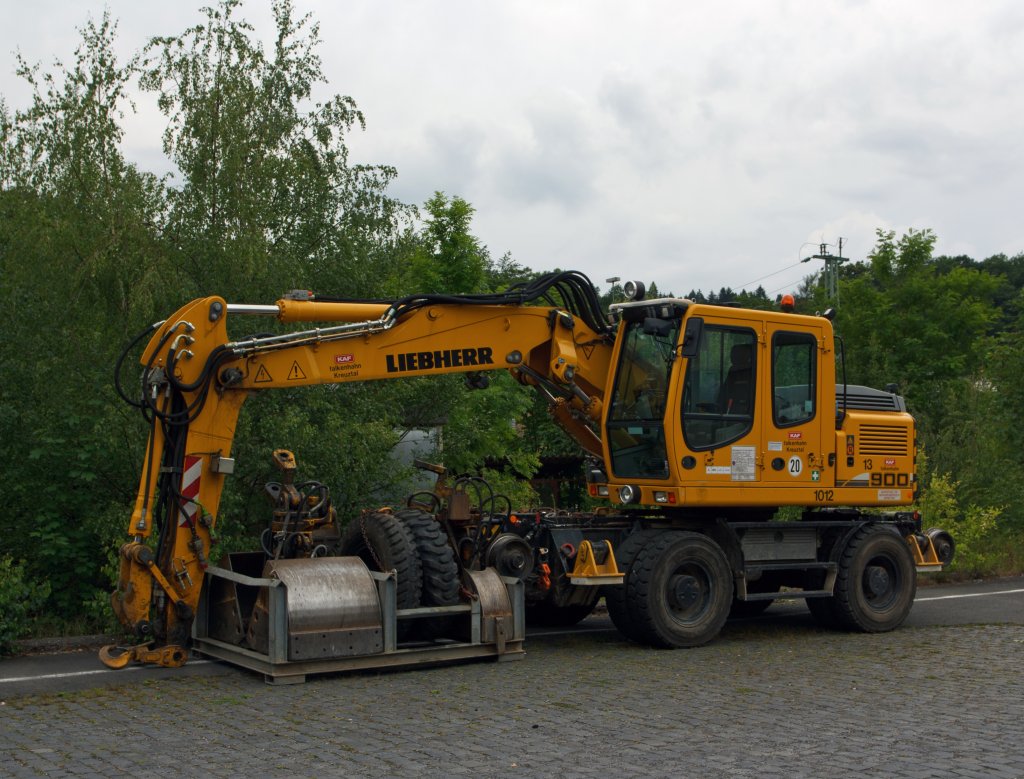 Two road rail excavator (Liebherr A 900 C ZW Litronic) from the KAF Falkenhahn Bau AG, Kreuztal(Germany) on 17.06.2011 in Betzdorf/Sieg.