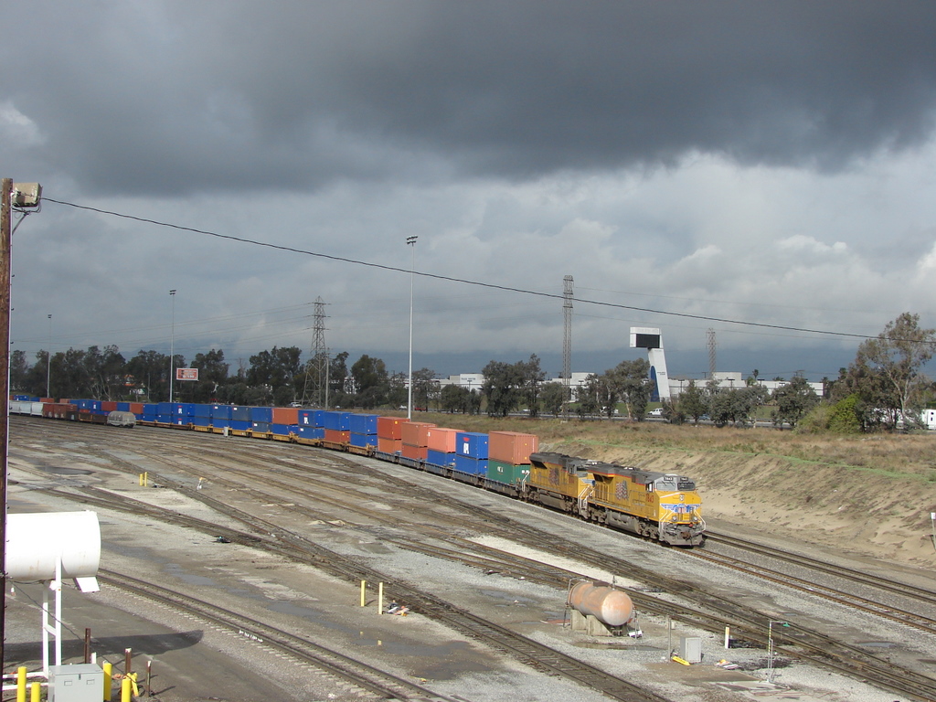 UP 7834 at Colton Yard, CA, under threatening skies