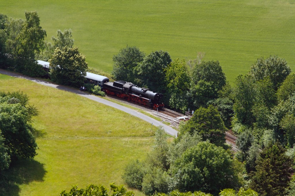 View from the Castle Knigstein / Taunus on 16.06.2011: The German Steam Locomotive 52 4867 of the Historic railroad Frankfurt (HEF) comes with a special train from Frankfurt-Hoechst and is already behind Kelkheim, now they go up to Knigstein / Taunus. Here was on Pentecost 2011 Station festival.