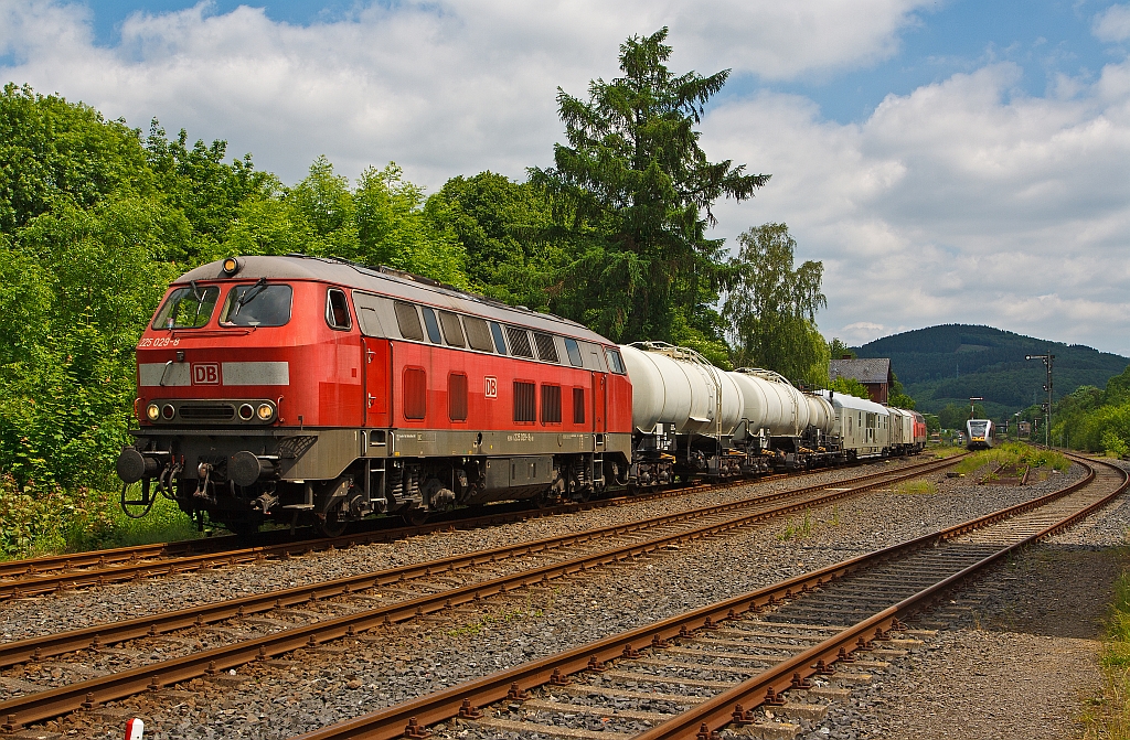 Weed spraying train of the Hellertatbahn (KBS 462) on 02.06.2012 in Herdorf. The train consisted of: Diesel locomotive 225 029-8, 2 tank wagons with water (60 80 092 4 544-0 and  60 80 092 4 545-7), tank wagons with chemicals resources (60 80 092 4 541-6), spray wagon (60 80 092 3019-4), device wagon (60 80 092 3881-7), residential repair wagons (60 80 092 3847-8) and at the end diesel locomotive 225117-8.