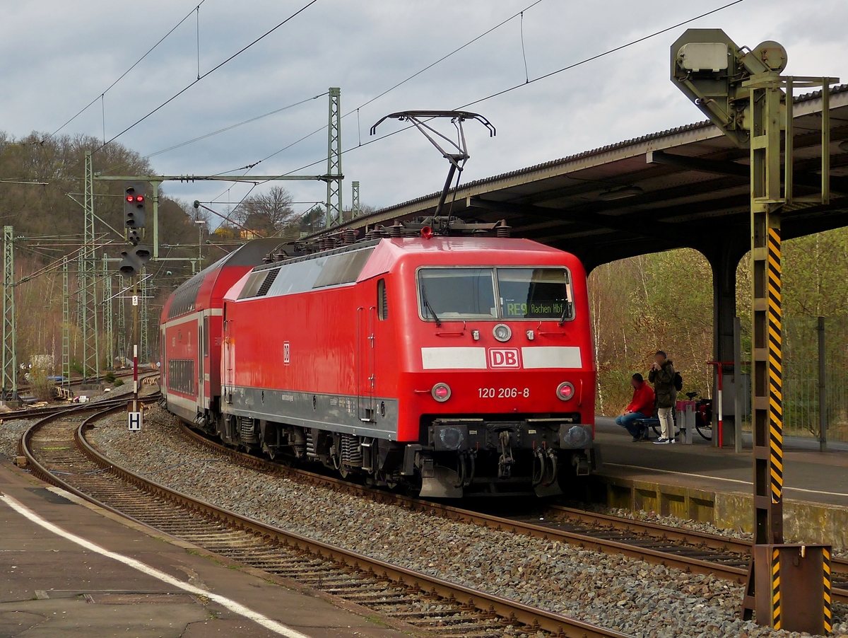 . 120 206-8 is pushing the RE 9 Siegen - Aachen (Rhein-Sieg-Express) out of the station of Betzdorf/Sieg on March 22nd,2014.