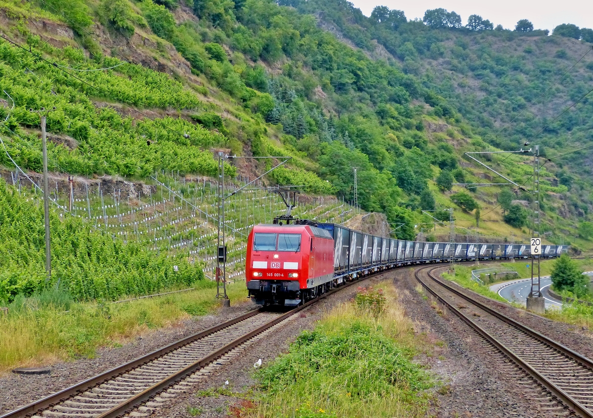 . 145 001-4 is heading a goods train in Kattenes on June 21st, 2014.