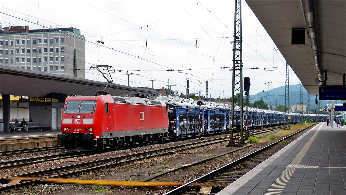 . 185 151-8 is hauling a goods train through the main station of Koblenz on May 27th, 2014.