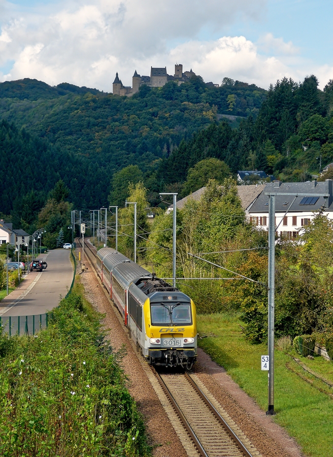 . 3015 is hauling the IR 115 Liers - Luxembourg City through Michelau on September 20th, 2014.