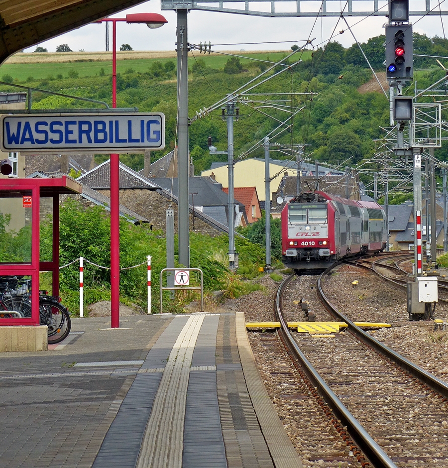 . 4010 is hauling a RE from Trier into the station of Wasserbillig on July 15th, 2014.