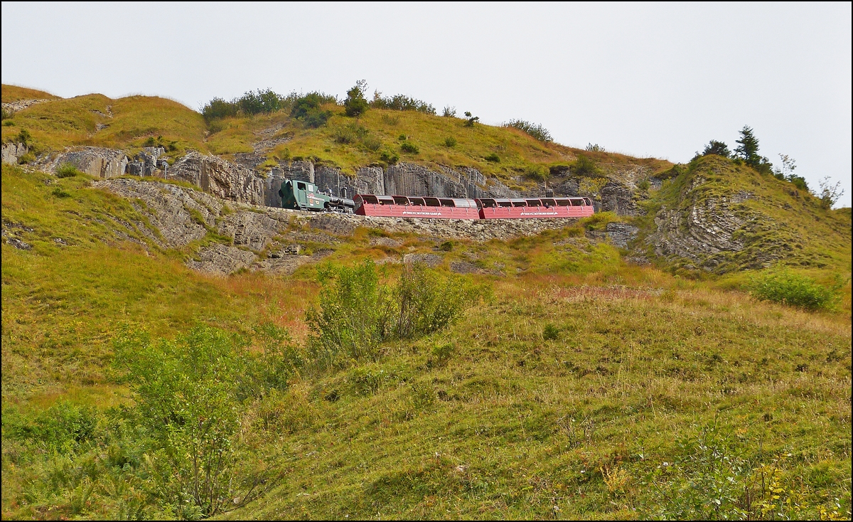 . A BRB stam train is climbing up the last meters of the track just before arriving in the summit station Rothorn Kulm on September 28th, 2013.