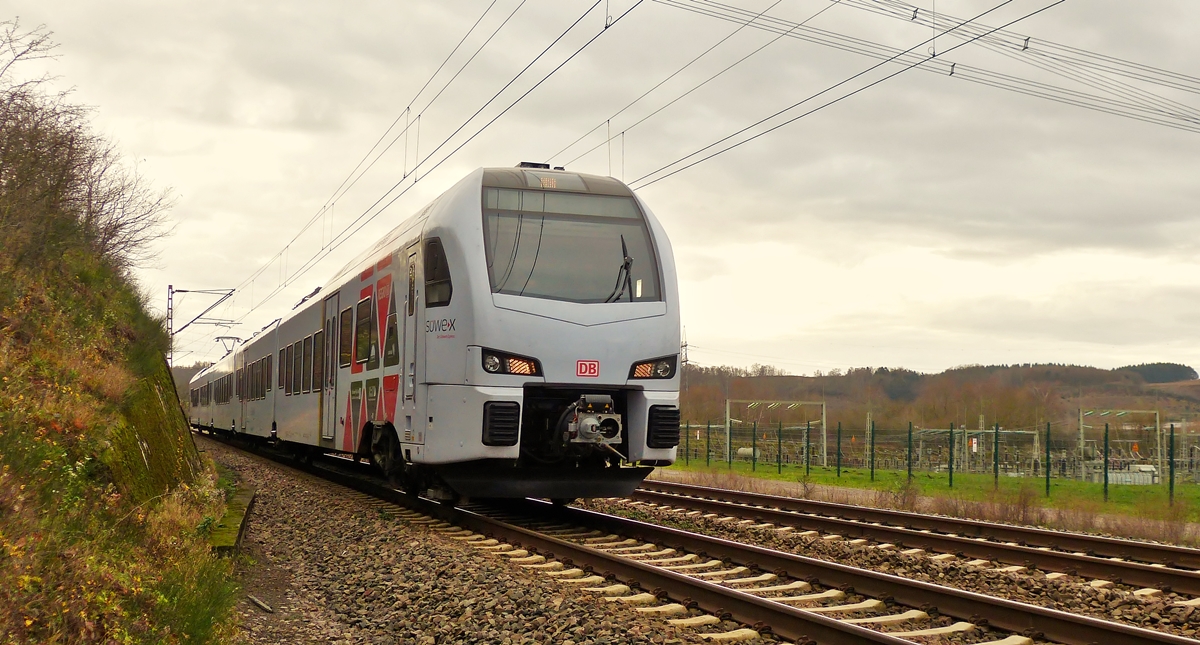 . A DB Regio Swex FLIRT to Koblenz main station is running between Bous and Ensdorf on December 20th, 2014.