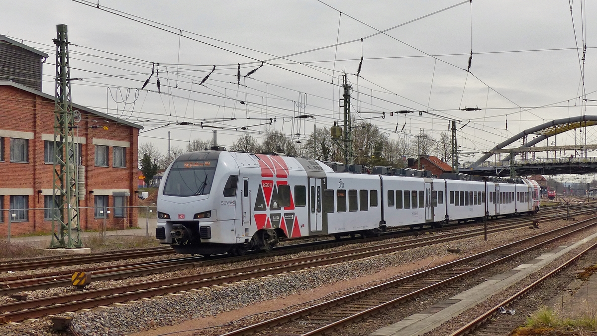 . A DB Regio SÜWEX is leaving the station of Dillingen/Saar on its way from Mannheim to Koblenz on April 3rd, 2015.