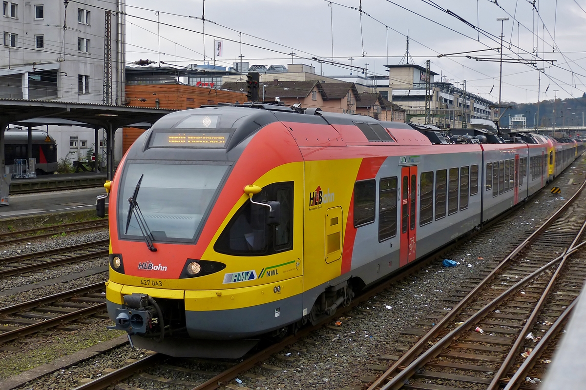 . A HLB (Hessische Landesbahn) 427 043 pictured in Siegen main station on November 2nd, 2014.