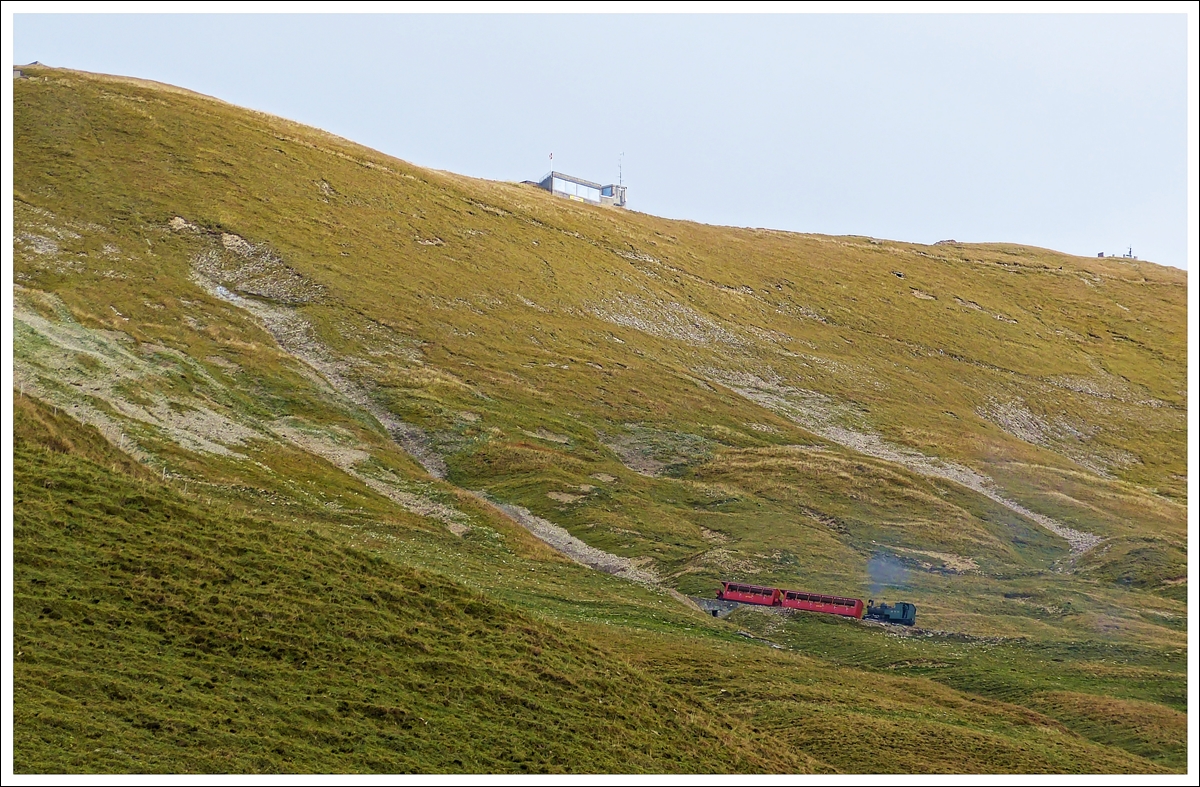 . A litte BRB steam train lost in the magnificent landscape near Brienzer Rothorn on September 29th, 2013.