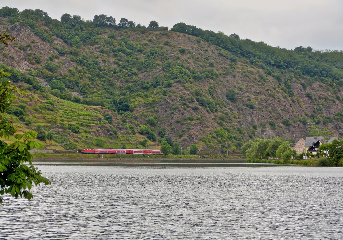 . A RE 1 Koblenz - Saarbrücken is running on the Mosel track between Lehmen and Kattenes on June 20th, 2014.