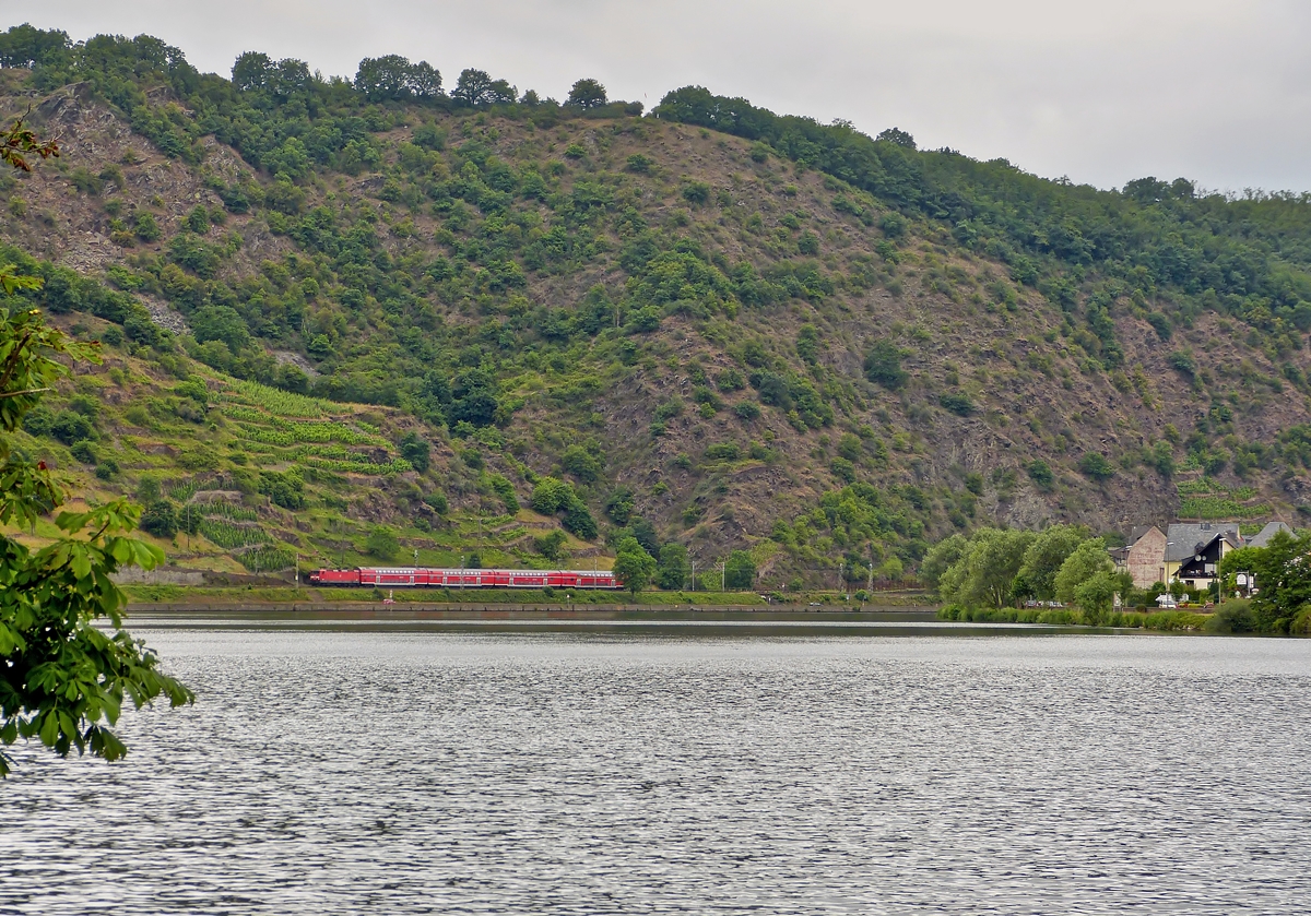 . A RE 1 Koblenz - Saarbrcken is running on the Mosel track between Lehmen and Kattenes on June 20th, 2014.