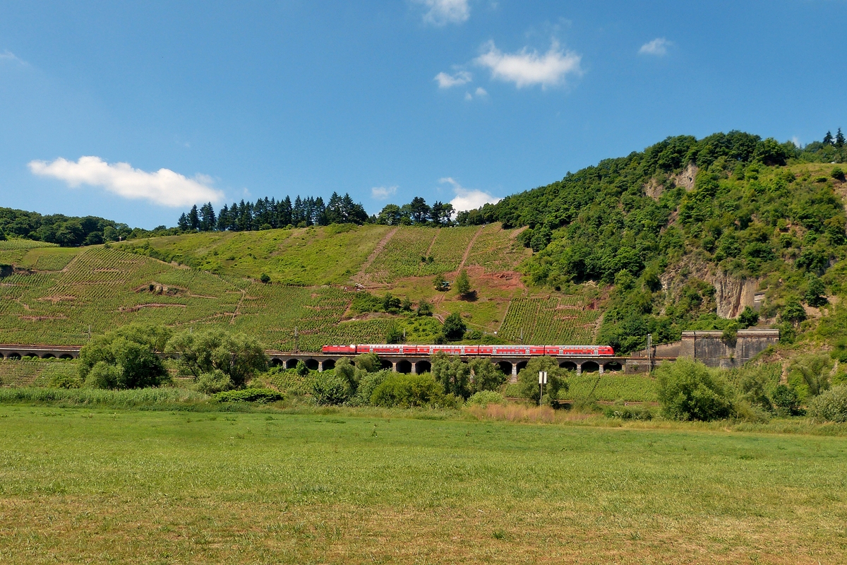 . A RE 1 Saarbrcken - Koblenz is running on the slope viaduct near Pnderich just before entering into the Prinzenkopf tunnel on June 21st, 2014.