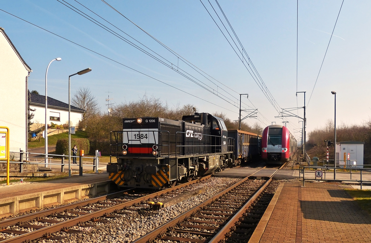 . CFL Cargo 1584 is hauling a freight train through Betzdorf on March 18th, 2015.