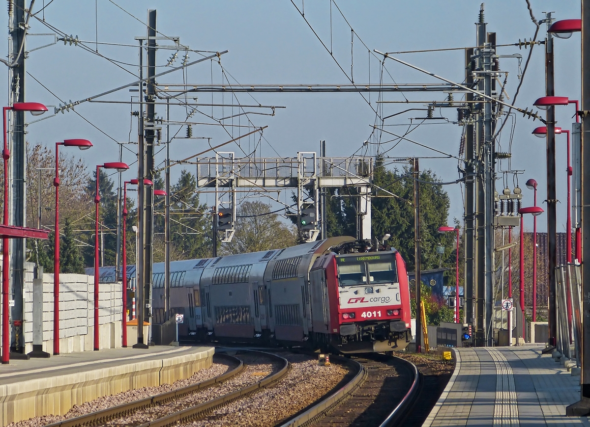 . CFL Cargo 4011 is pushing its train out of the station of Noertzange on January 31st, 2014.